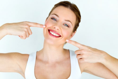 Portrait of beautiful young woman with perfect smile.